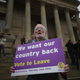 A “Vote to leave” campaigner holds a placard on May 25, 2016, in Bolton, England.
Christopher Furlong/Getty Images